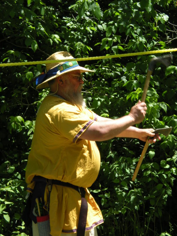 Lord Thomas in the axe throwing competition at St. George, 2010